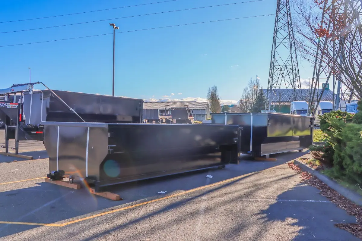 Roll-off dumpster ready for waste disposal at job site for 2 Yard Dumpster Rental in Cortland